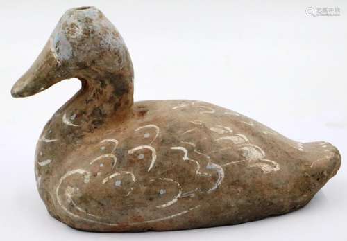 A Han Dynasty zoomorphic candle holder in the form of a duck...