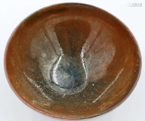 A Song Dynasty glazed bowl, asymmetric finish to glaze on fo...