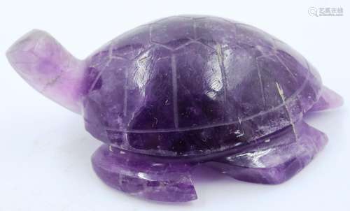 A Qing Dynasty carved purple jade zoomorphic turtle, L: 5 cm...