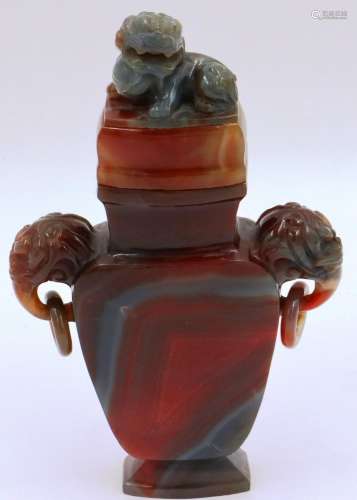 A large and important carved agate flask, covered, having Fo...