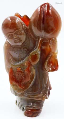 An excellent carved red agate figural snuff bottle with stop...