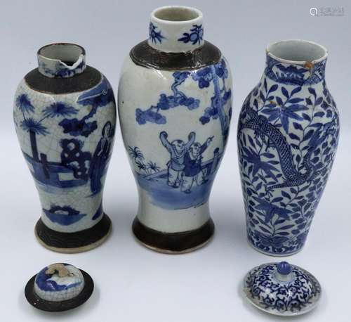 Three blue-over white decorated jars, two with covers, compr...