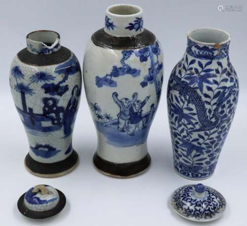 Three blue-over white decorated jars, two with covers, compr...