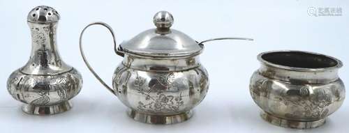 A 19th century Qing Dynasty export silver three piece cruet ...