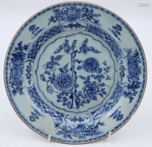 An 18th century porcelain plate with floral decoration in bl...