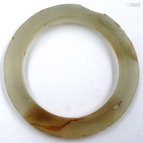 Carved jade bangle, chip to edge. Internal D: 48 mm, externa...