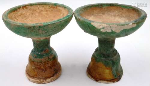 A pair of Ming Dynasty glazed white clay pedestals, each D: ...