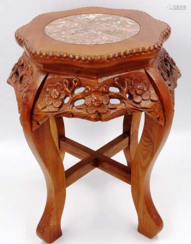 A 20th century stained and carved wood vase stand, the top i...
