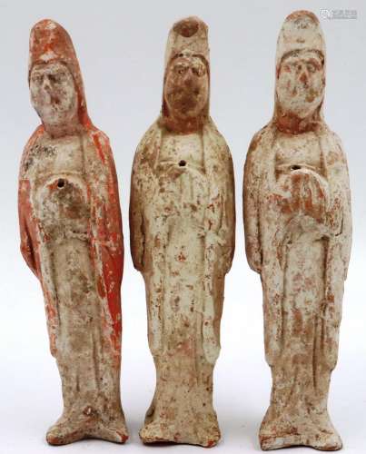 Three Ming Dynasty guardians, each still retaining some orig...