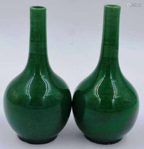 A pair of glazed bottle vases, of diminutive proportions in ...