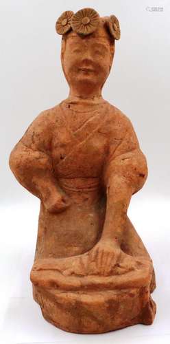 A large terracotta Han Dynasty figure of a kneeling female w...