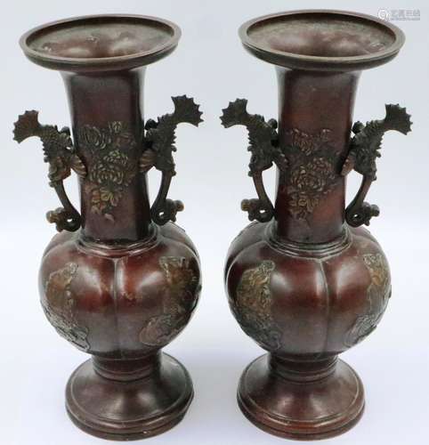 A pair of Japanese Meiji period bronze vases, the tubular ne...