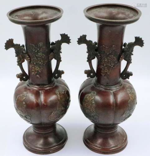 A pair of Japanese Meiji period bronze vases, the tubular ne...