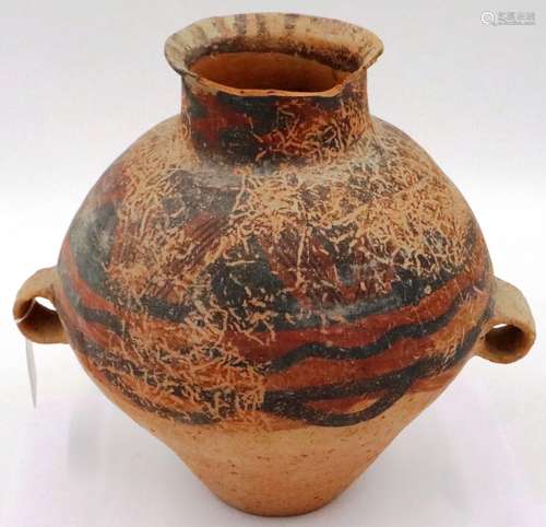 A Neolithic period vessel, the body tapered with two ring ha...