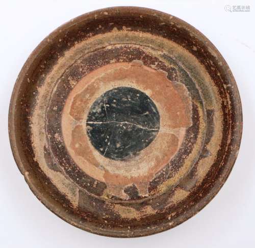 A Song Dynasty terracotta shallow circular dish, having a mu...