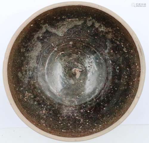 A Song Dynasty large glazed clay bowl, D: 15 cm, H: 7 cm. P&...