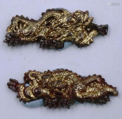 A pair of 19th century gilt metal Menuki, each L: 45 mm. P&a...