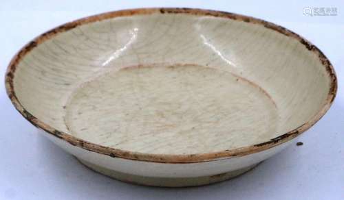 A Ming Dynasty light-celadon glazed saucer or shallow dish, ...