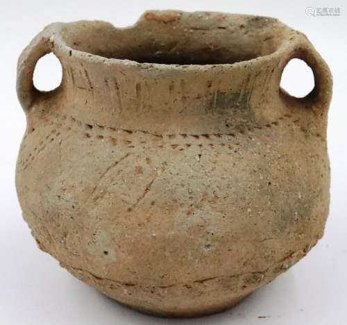 A Neolithic period urn or vessel, unusually decorated with i...