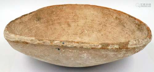 A very large Han Dynasty bowl or receptacle, off-circular an...