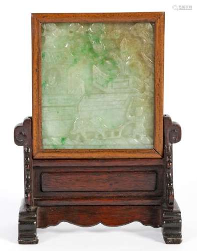 Chine, XXe sièclePlaque en jade sculptée à décor d’un paysag...