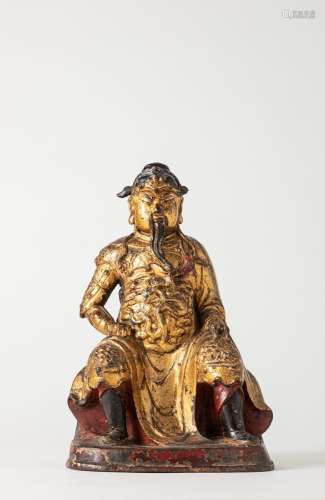 A gilt-lacquered bronze Guandi. China, Ming dynasty, 17th ce...