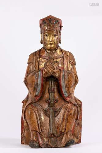 A carved wood taoist deity. China, Ming dynasty (1368-1644)