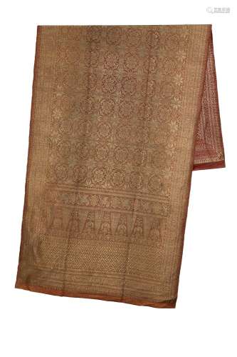 A Sarong Songket in red silk with woven with gold thread. Su...