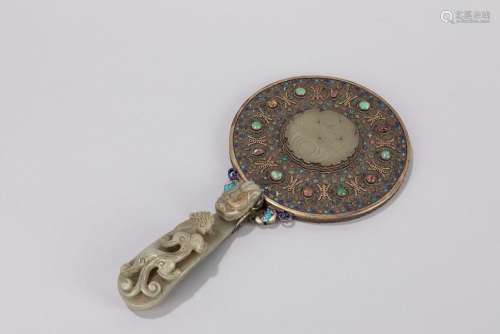 A silvered mirror, mounted with jades. China, 19th century