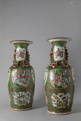 A pair of Famille Rose Canton porcelain vases. China, 19th c...