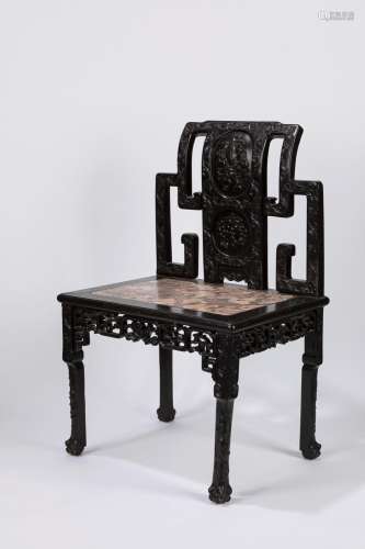 A finely carved Hongmu chair. China, late 19th century