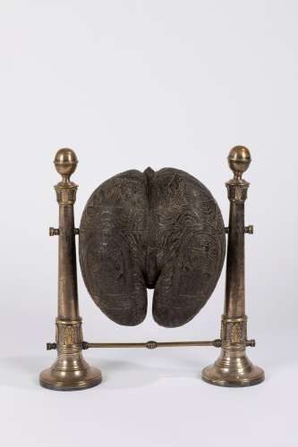 A finely carved sea coconut. South East Asia, 19th century