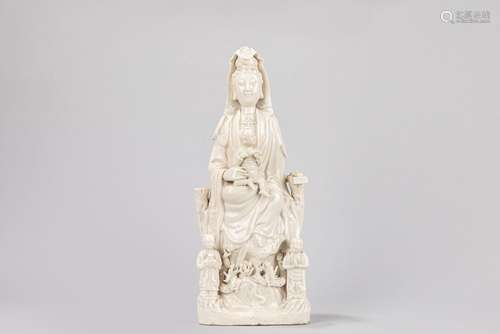 A Blanc de Chine Guanyin with child. China, late 19th centur...