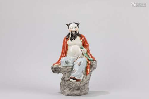 A polychrome porcelain figure of a wise man. China, Republic...