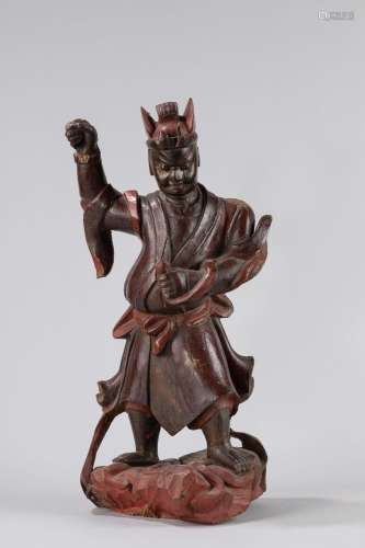 A carved wood warrior. China, 19th century