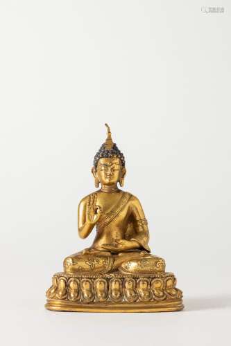 A gilt bronze Buddha. Tibet, 18th century