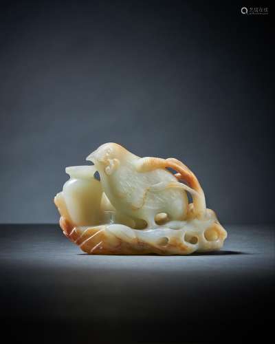 A Chinese white and russet jade model of a quail