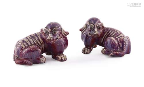 A pair of Chinese flambe models of Buddhist lions