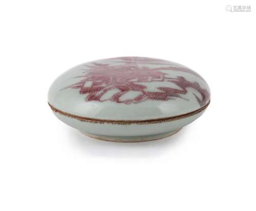 A Chinese underglaze red and pale-celadon seal paste box and...