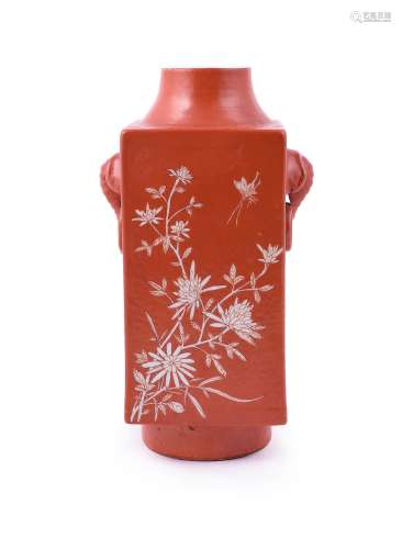 A Chinese coral red square cong vase