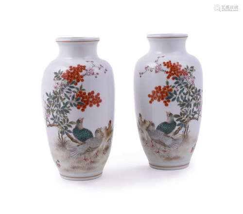 A pair of Chinese enamelled vases