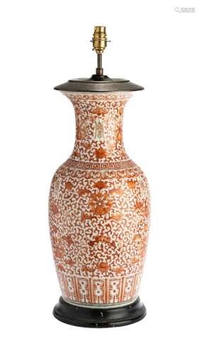 A CHINESE IRON-RED BALUSTER VASE MOUNTED AS A LAMP
