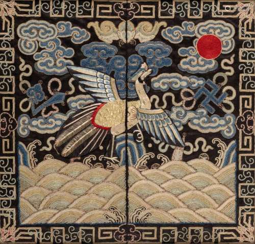 A CHINESE EMBROIDERED BLUE SILK RANK BADGE OF A PHOENIX