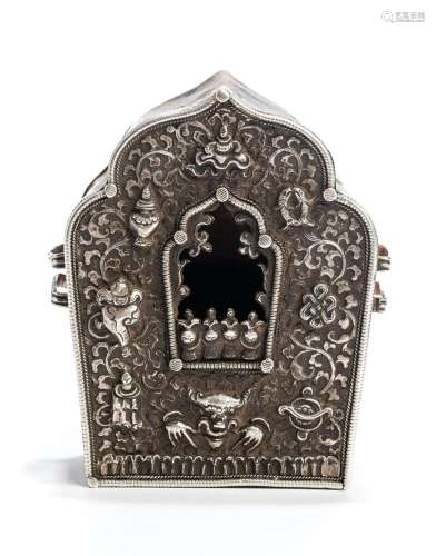A COPPER AND SILVER ALLOY AMULET BOX (GAU)
