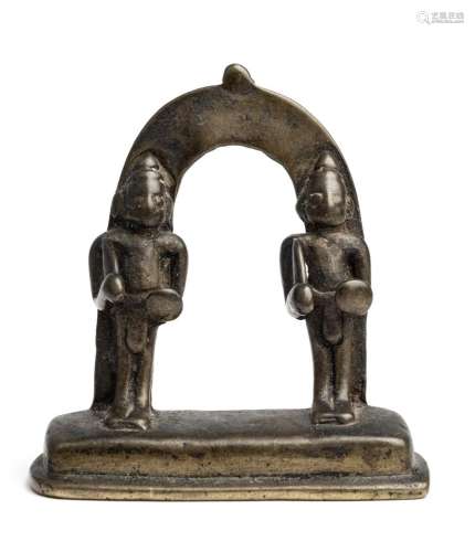 A SMALL BRONZE SHRINE DEPICTING TWO WARRIORS