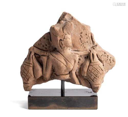 A MAJAPAHIT TERRACOTTA RELIEF FRAGMENT