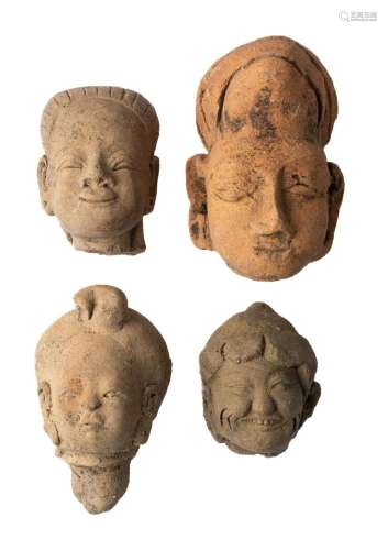 FOUR SMALL MAJAPAHIT TERRACOTTA HEADS