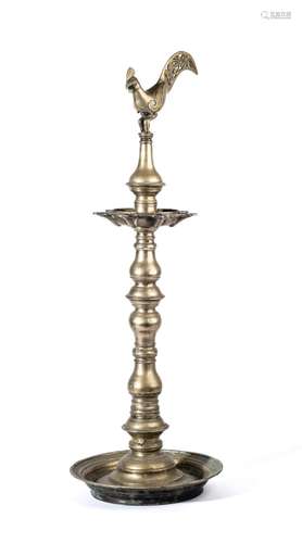 A BRASS TEMPLE LAMP