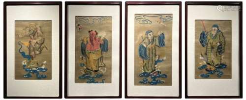 A set of four chinese embroidered hanging panels of immortal...