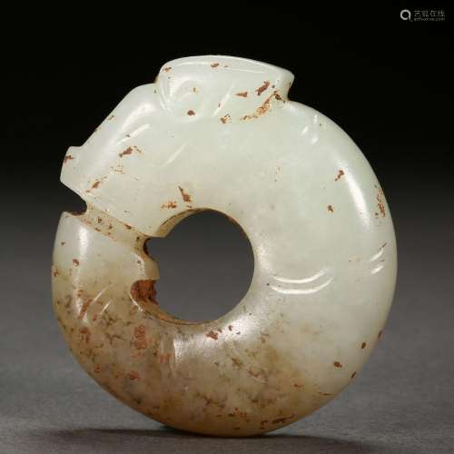 A Chinese Carved Jade C-shape Dragon